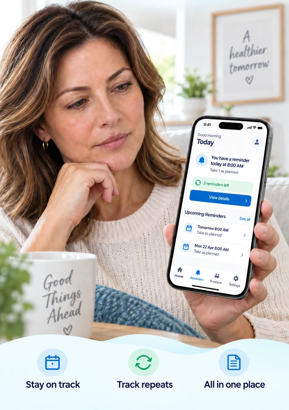 A woman holds a phone showing MediRemind medication reminders.